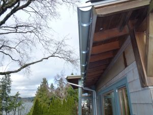 GG-endcap-on-Zincalume-half-round Bellevue Gutters